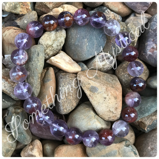 Bracelet - Super Seven Cacoxenite Amethyst - 8mm round stone